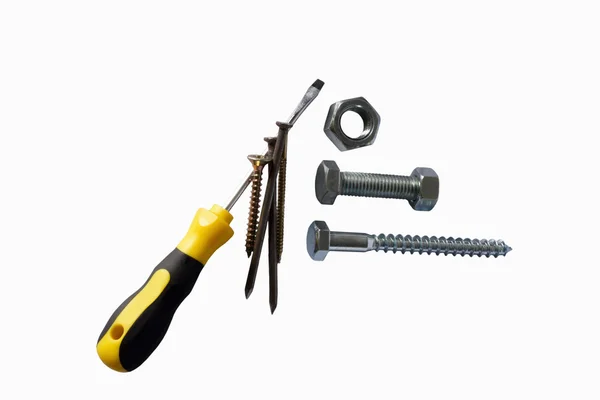 Assorted screws nuts, bolts, nails and screwdriver — Stock Photo, Image