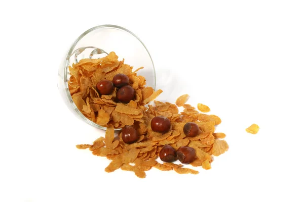 stock image Cornflakes and nuts in a glass bowl