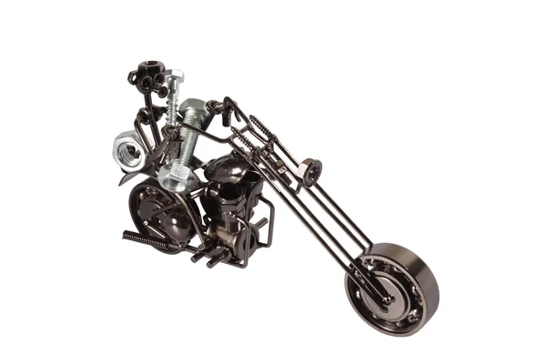 Іграшковий мотоцикл з болтів і горіхів, що несуть болти і горіхи — стокове фото