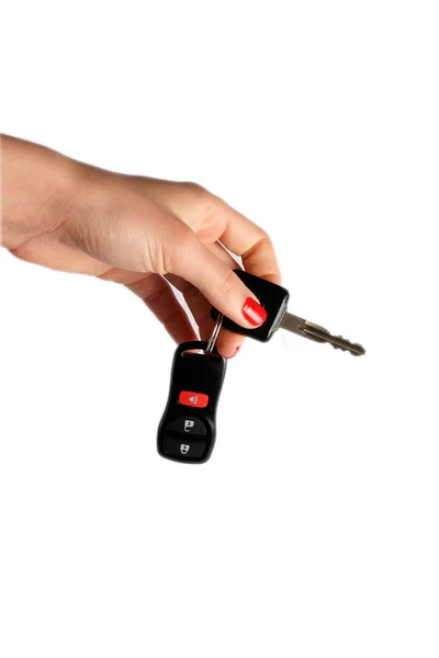 Nouvelles clés de voiture pendantes de la main — Photo