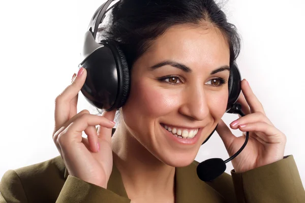 Krásný pracovníkem s headsetem usmívá během c telefon — Stock fotografie