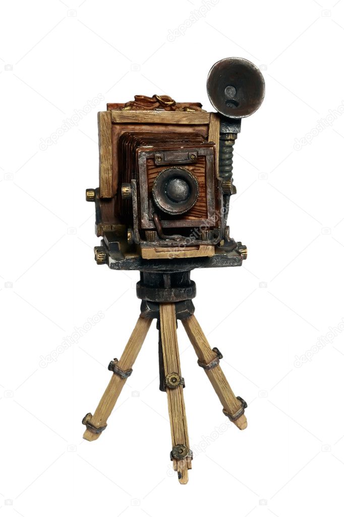 Model of old photographic camera on white background