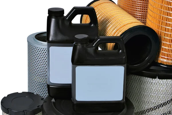 New automotive oil filter cartridge and plastic can — Stock Photo, Image