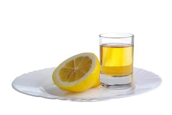 Limon egy tányérra Stock Kép