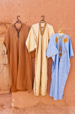 Djellaba - traditional long, loose-fitting unisex outer robe. clipart