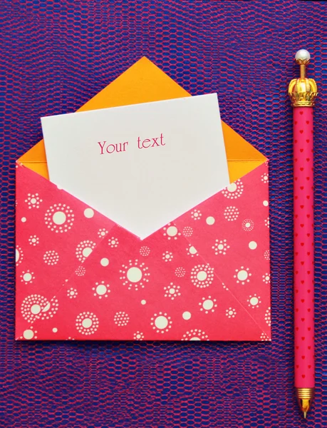 Beautiful pink envelope with a note inside — Stock Photo, Image