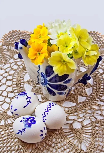 stock image Still life with Easter eggs on lace doily