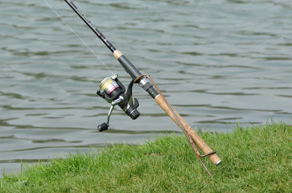 stock image France, a fishing rod by a pond