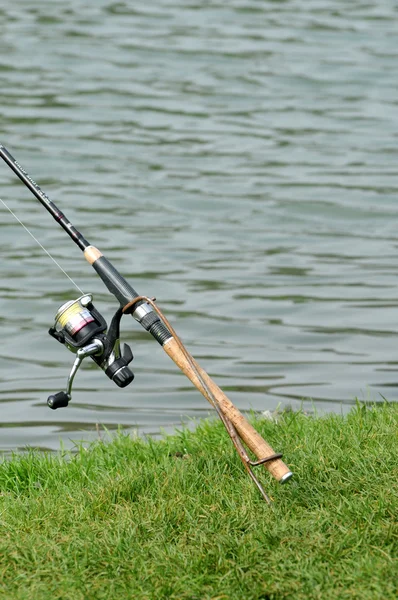 stock image France, a fishing rod by a pond