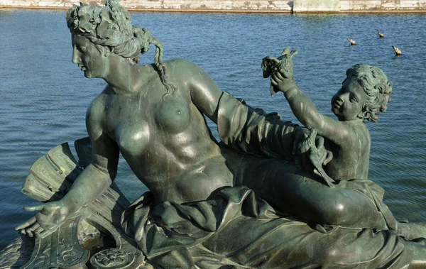 stock image Bronze statue in the park of Versailles Palace