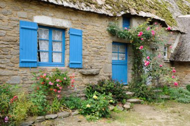 France, old thatched cottage in Saint Lyphard clipart