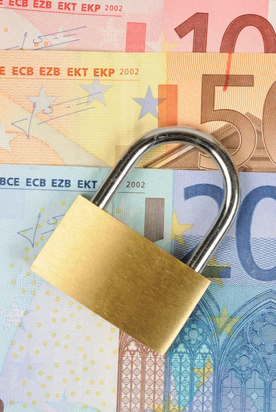Close up of a padlock on Euro banknote — Stock Photo, Image