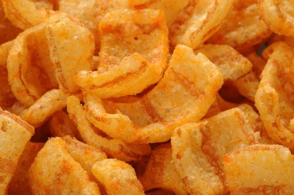 Close up of bacon andpaprika flavored snacks — Stock Photo, Image