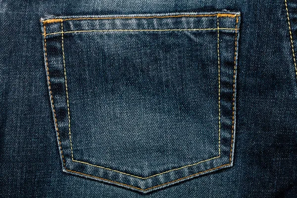 Tecido de jeans azul com bolso — Fotografia de Stock