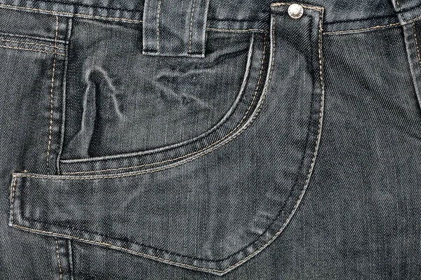 Grey jeans fabric with pocket — Stock Photo, Image