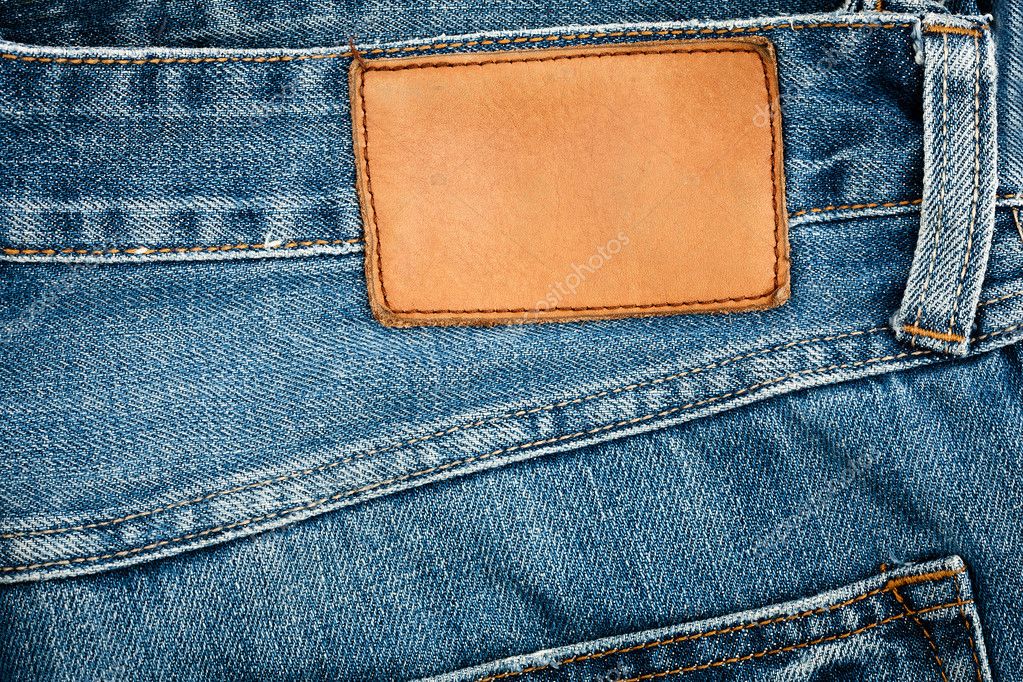 Blank leather jeans label sewed on a blue jeans — Stock Photo © Taigi ...