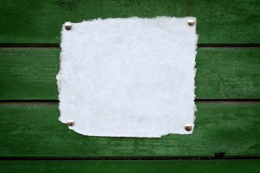 Close up of handmade note paper on wooden background clipart