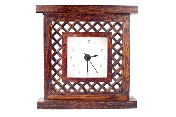 Horloge en bois sculpté — Photo