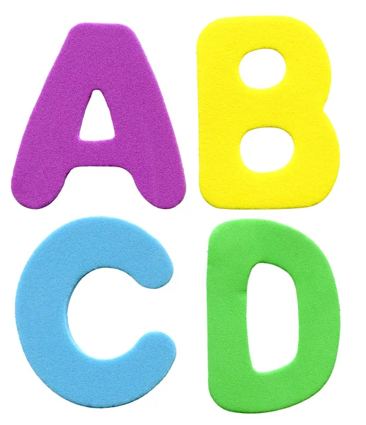 Цветные пенные буквы — стоковое фото