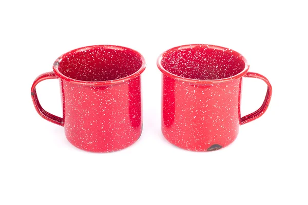 Дві старовинні червоні металеві чашки — стокове фото