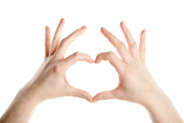 Žena rukama dělat srdce znamení — Stock fotografie