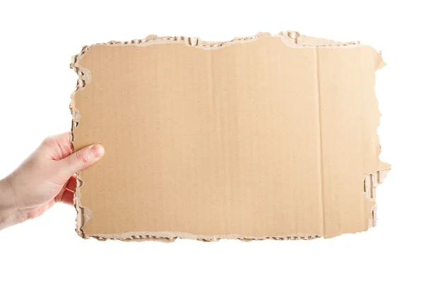 Hand holding cardboard — Stock Photo, Image