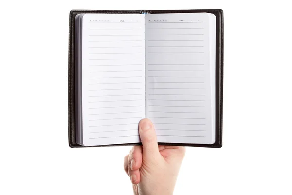 Hand holding diary — Stock Photo, Image