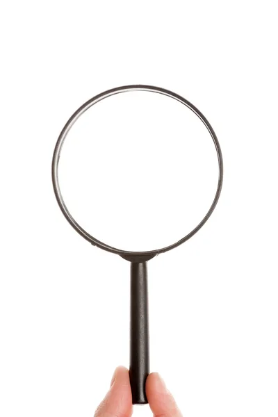 Fingers holding magnifying glass — Stock Photo, Image