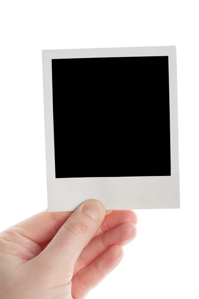 One instant photo in hand — Stock Photo, Image