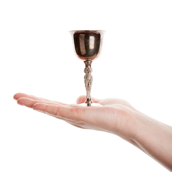 Female hand holding silver goblet — Stock Photo, Image