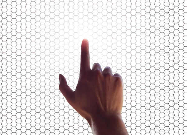 Bir dokunmatik ekran ızgara üzerinde el — Stok fotoğraf