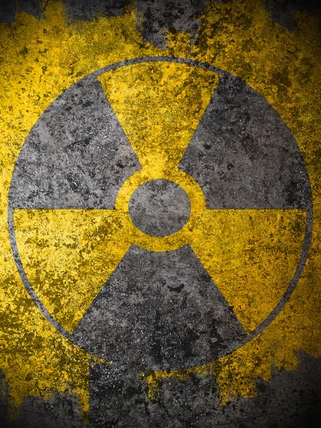 stock image Dirty yellow nuclear warning symbol