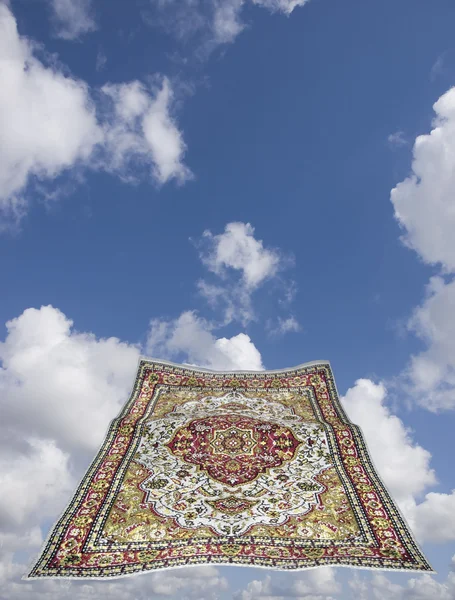 Magic carpet in a blue sky — Stock Photo, Image