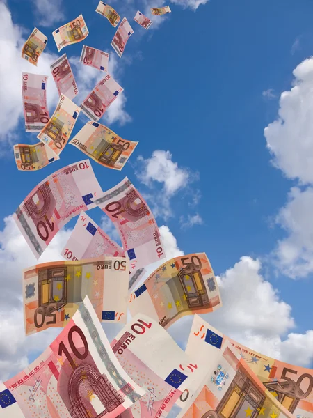 A lot of flyinq away banknote on a sky background — Stock Photo, Image