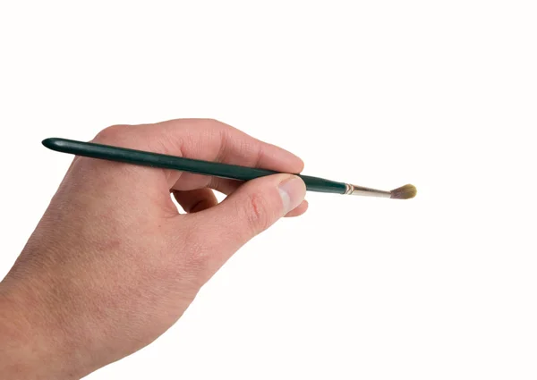 Hand och pensel — Stockfoto
