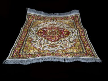 Flynig turkish carpet on black clipart