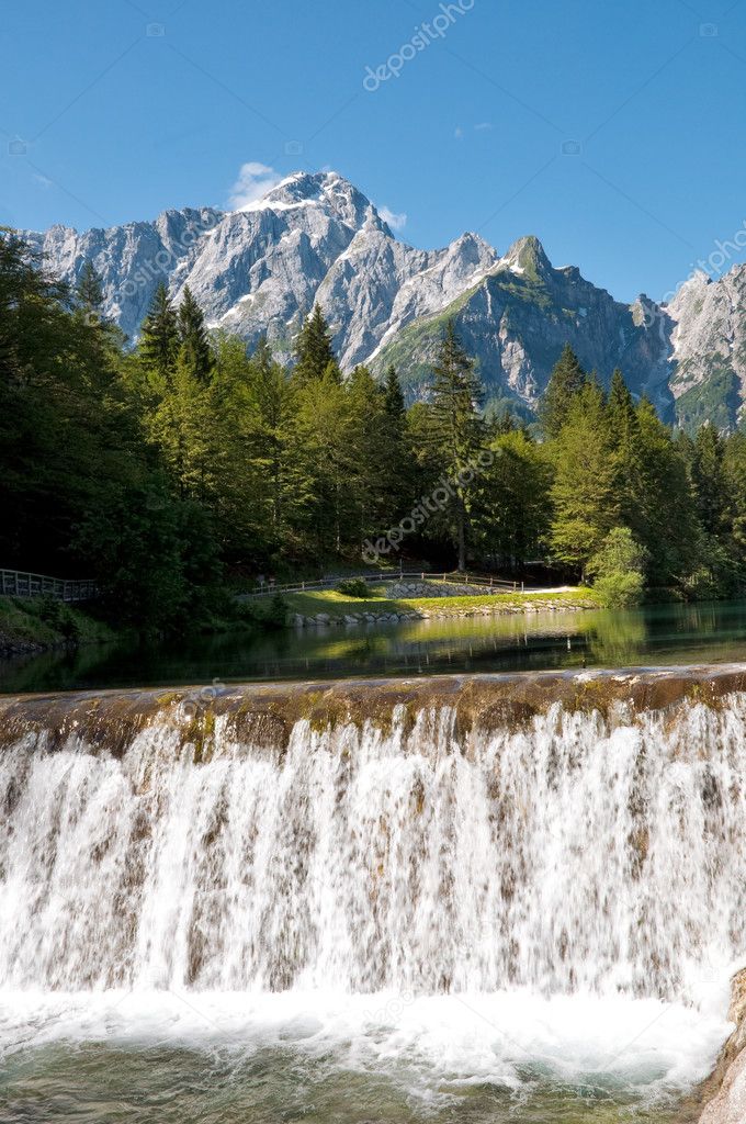 Lago di Fusine e monte Mangart with waterfall