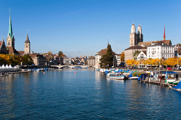 Limmat river and city on a sunny day at Zurich - Switzerland