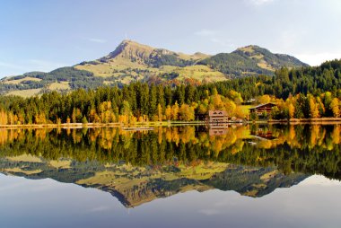 Panoramic view of lake and mountains at Schwarzsee - Kitzbuhel A clipart