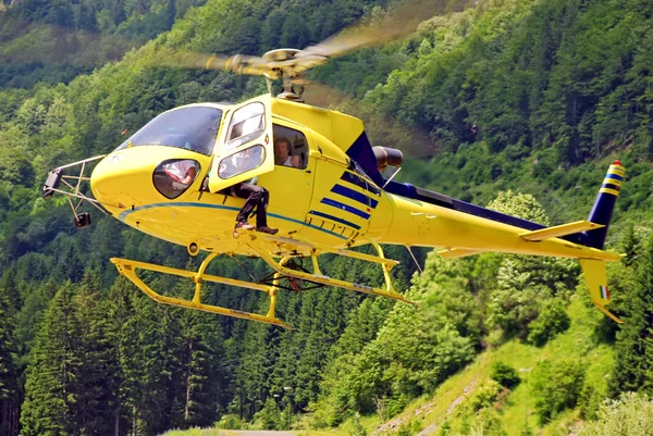 stock image Yellow helicopter landing