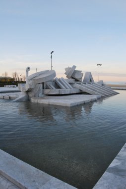 The beach, the harbor and the promenade of Pescara clipart