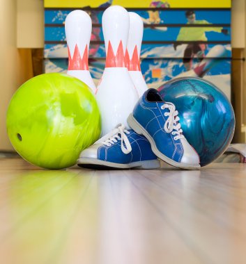 Bowling balls, shoes and pins clipart