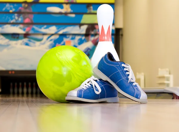 Bowling ball, shoes and pins — Stock Photo, Image