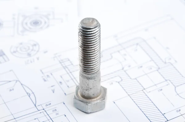 stock image Screw bolt on a paper plan
