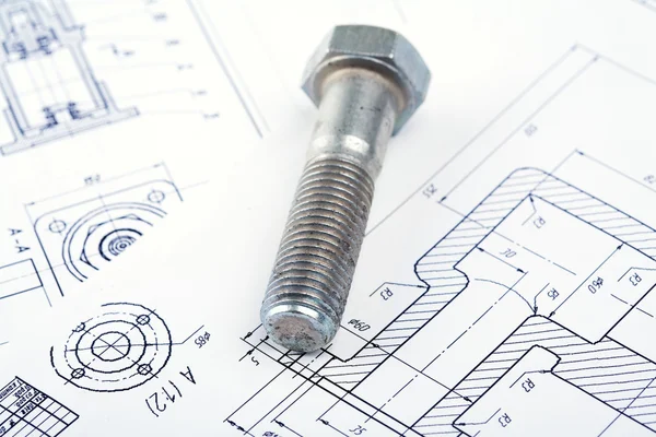 stock image Screw bolt on a paper plan