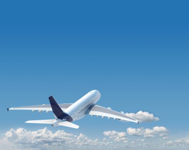 Aiplane with copy space in the sky clipart