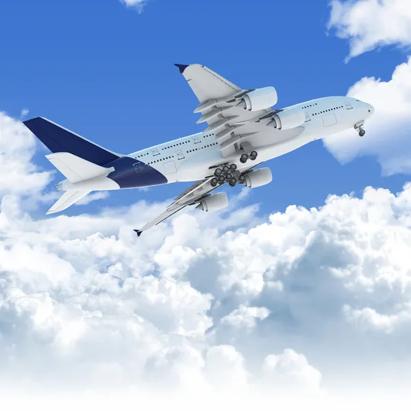 Letadlo letící nad mraky na startu podhledem — Stock fotografie