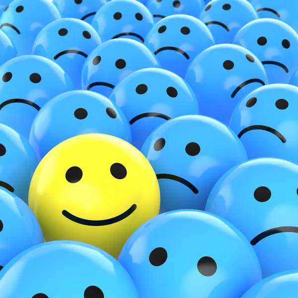 Happy smiley between sad ones — Stock Photo, Image