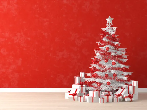 Bílý vánoční strom na červené zdi Stock Snímky