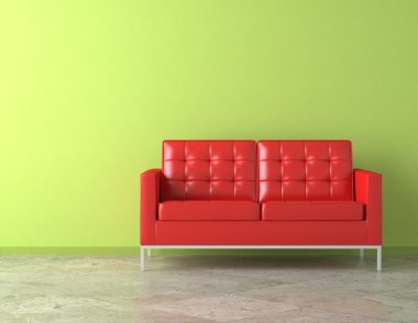 Red couch on green wall